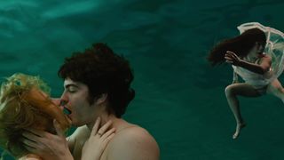 Evan Rachel Wood nude - Throughout the Universe (2007)