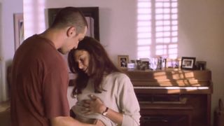 Kari Wuhrer nude - King of the Ants (2003)