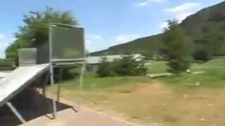 A hottie is taking care of her pussy's needs in an outdoor voyeurism sex scene