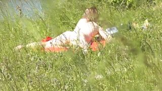 Outside. Naughty beach. Random passerby dude by sea spotted nude dame sunbathing. Outdoor. Naturist