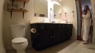 Bathroom peeing. My sandy-haired stepmom caught nude in robe