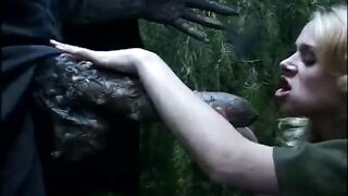 Blowjob to a monster. Retro adult movie scene