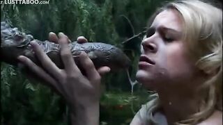 Blowjob to a monster. Retro adult movie scene