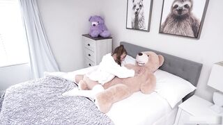 Litle stepsis plays with a teddy bear with a pussy